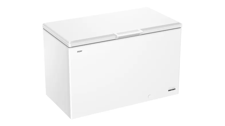 Side view of the Haier chest freezer with a hinged lid and a top handle Side view of the Haier chest freezer with a hinged lid and a top handle