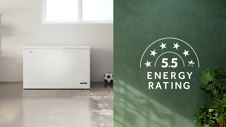 Haier white chest freezer in a modern room with a 5.5 energy rating graphic Haier white chest freezer in a modern room with a 5.5 energy rating graphic