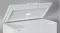 Close-up of the Haier white chest freezer with open lid Close-up of the Haier white chest freezer with open lid
