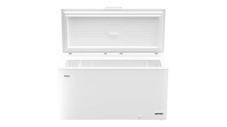 Open the Haier chest freezer with the top lid raised, revealing a wide storage compartment and a clean interior Open the Haier chest freezer with the top lid raised, revealing a wide storage compartment and a clean interior