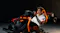 Low-angle front view of a person showcasing a racing wheel Low-angle front view of a person showcasing a racing wheel