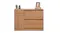 Contemporary oak cabinet with drawers and door, styled with books, plants, and a decorative frame Contemporary oak cabinet with drawers and door, styled with books, plants, and a decorative frame