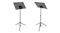 A side-by-side view of a black folding music stand with a perforated metal sheet holder and sturdy tripod base A side-by-side view of a black folding music stand with a perforated metal sheet holder and sturdy tripod base