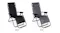 Two TSB Living chairs side-by-side displaying the Black and Grey options Two TSB Living chairs side-by-side displaying the Black and Grey options