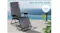 Grey Zero Gravity Chair styled on a modern patio overlooking a calm blue ocean Grey Zero Gravity Chair styled on a modern patio overlooking a calm blue ocean