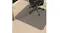 Home office setup with desk and swivel chair placed on a clear chair mat, providing floor protection and stable rolling on carpet Home office setup with desk and swivel chair placed on a clear chair mat, providing floor protection and stable rolling on carpet