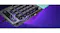 Detailed view of RGB-lit gaming keypad with raised keys, touch controls, and sleek metallic finish Detailed view of RGB-lit gaming keypad with raised keys, touch controls, and sleek metallic finish
