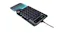 Mechanical keypad with rotary knob, USB cable, and detachable ribbed wrist rest on one side Mechanical keypad with rotary knob, USB cable, and detachable ribbed wrist rest on one side