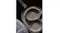 Close-up view of headphones folded inside a compact carrying case Close-up view of headphones folded inside a compact carrying case