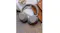 Close-up view of headphones on top of a wooden table beside a bag and scrunchies Close-up view of headphones on top of a wooden table beside a bag and scrunchies