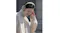 A person listening to music using the Sony wireless over-ear headphones A person listening to music using the Sony wireless over-ear headphones