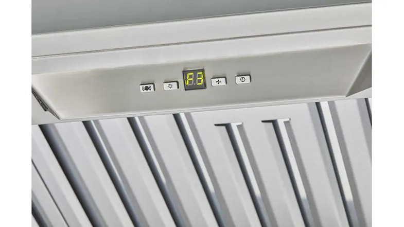 Close-up of the range hood control panel with digital display, buttons, and a metal grease filter beneath Close-up of the range hood control panel with digital display, buttons, and a metal grease filter beneath
