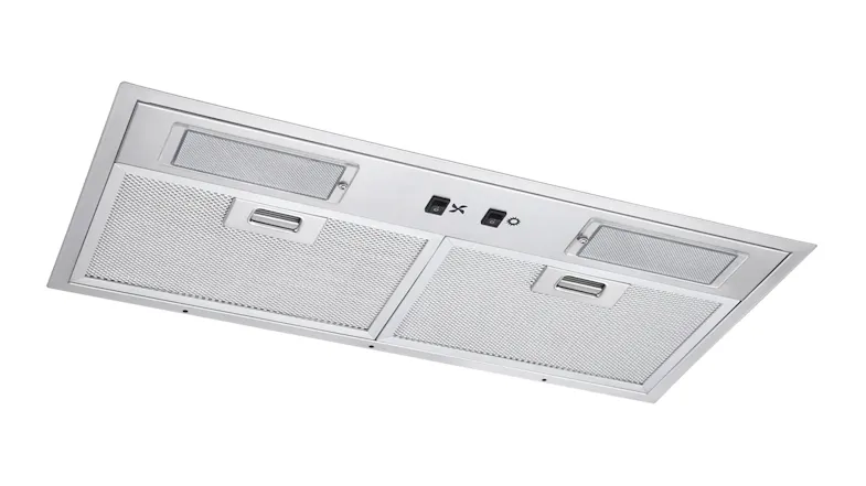 Angled view of the stainless steel range hood underside with two mesh filters, dual lights, and fan/light switches Angled view of the stainless steel range hood underside with two mesh filters, dual lights, and fan/light switches