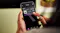 Smartphone controlling the Haier 600 Series steam oven via app, showing temperature, preheating status and remote cooking features Smartphone controlling the Haier 600 Series steam oven via app, showing temperature, preheating status and remote cooking features