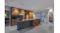 Modern kitchen with timber cabinetry, countertop, pendant lights, artwork, and concealed black glass rangehood Modern kitchen with timber cabinetry, countertop, pendant lights, artwork, and concealed black glass rangehood