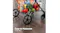 Close-up of the cart wheels and lower basket with groceries, highlighting smooth rolling and easy manoeuvrability Close-up of the cart wheels and lower basket with groceries, highlighting smooth rolling and easy manoeuvrability