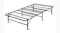 Angled view of a foldable black metal bed frame with a wire grid platform Angled view of a foldable black metal bed frame with a wire grid platform