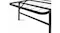 Close-up of a rounded corner and wire grid surface on a black metal bed frame with support leg Close-up of a rounded corner and wire grid surface on a black metal bed frame with support leg