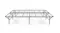 Front view of a wide platform bed frame with a metal grid surface and reinforced legs Front view of a wide platform bed frame with a metal grid surface and reinforced legs