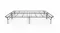 Wide front view of a black folding metal bed frame with dual panels and wire grid support Wide front view of a black folding metal bed frame with dual panels and wire grid support