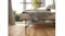 Bed with mattress on a black folding metal frame, highlighting angled triangular support beneath the frame and legs Bed with mattress on a black folding metal frame, highlighting angled triangular support beneath the frame and legs