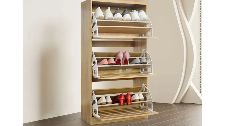 A 3 layered shoe cabinet in vertical setup inside a room A 3 layered shoe cabinet in vertical setup inside a room
