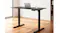 An adjustable desk frame set in a minimalist room, featuring sturdy legs, a control panel underneath, and a clean workspace setup An adjustable desk frame set in a minimalist room, featuring sturdy legs, a control panel underneath, and a clean workspace setup