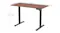 An adjustable desk frame with labelled dimensions showing a width range and height adjustment An adjustable desk frame with labelled dimensions showing a width range and height adjustment