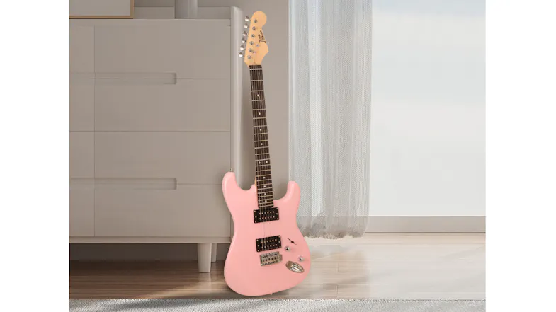 Pink electric guitar standing upright on a floor near a cabinet and a window curtain in a home setting Pink electric guitar standing upright on a floor near a cabinet and a window curtain in a home setting