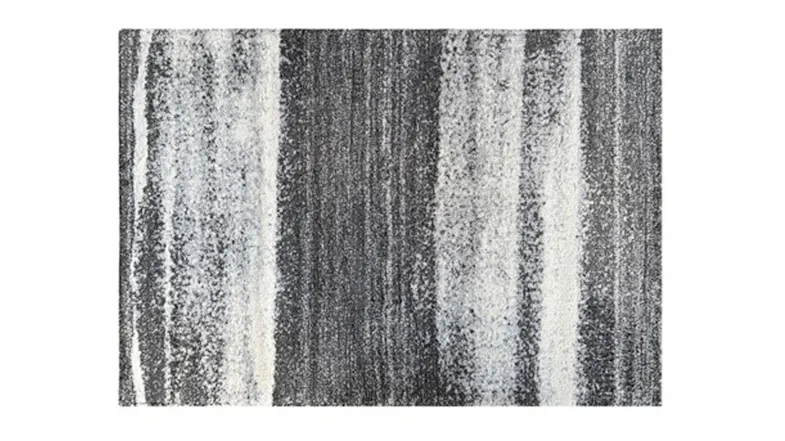 Top-down view of the Laine rug in ombre charcoal, showing horizontal bands Top-down view of the Laine rug in ombre charcoal, showing horizontal bands
