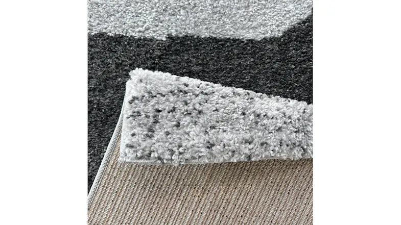 Close-up of the durable woven backing material and construction details of the Laine rug Close-up of the durable woven backing material and construction details of the Laine rug