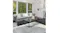 Modern living room featuring the plush Laine rug with a geometric grey, black, and white block pattern Modern living room featuring the plush Laine rug with a geometric grey, black, and white block pattern