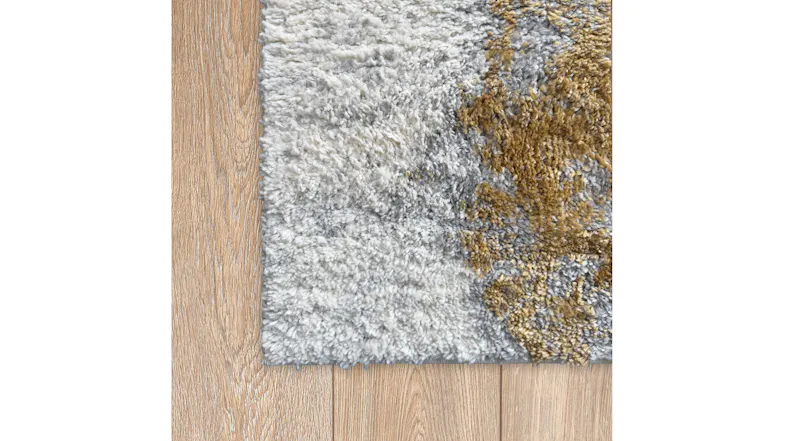 Detail shot of the clean corner edge of the Laine rug Detail shot of the clean corner edge of the Laine rug