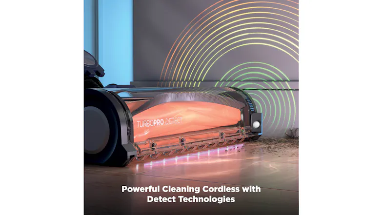 Close‑up of the vacuum cleaner head with an illuminated brush roll and debris‑detection graphics on a hard floor Close‑up of the vacuum cleaner head with an illuminated brush roll and debris‑detection graphics on a hard floor