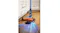 Close-up of the floor head cleaning debris on a wooden floor, with bright LED lights illuminating dust in front Close-up of the floor head cleaning debris on a wooden floor, with bright LED lights illuminating dust in front