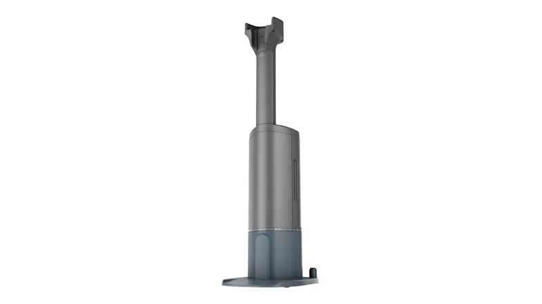 Standalone auto-empty dock in grey and blue, featuring a tall cylindrical body and base platform Standalone auto-empty dock in grey and blue, featuring a tall cylindrical body and base platform