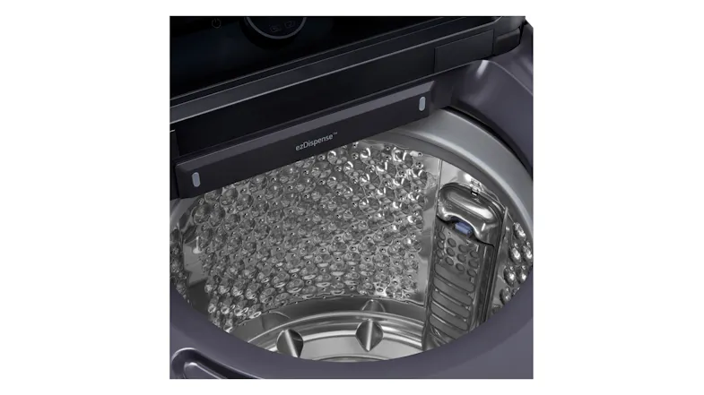 Close-up view of the washer’s drum with a closed automatic dispenser compartment Close-up view of the washer’s drum with a closed automatic dispenser compartment