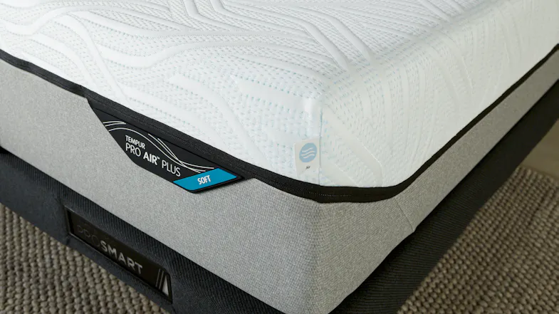 A close-up corner shot highlighting the "Soft" firmness label on a Tempur Pro Air Plus mattress A close-up corner shot highlighting the "Soft" firmness label on a Tempur Pro Air Plus mattress