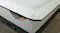 A close-up corner shot highlighting the "Firm" label on a Tempur Pro Air Plus mattress A close-up corner shot highlighting the "Firm" label on a Tempur Pro Air Plus mattress