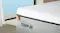 Detailed view showing the Tempur embroidered logo and premium zipper finish on the mattress cover Detailed view showing the Tempur embroidered logo and premium zipper finish on the mattress cover