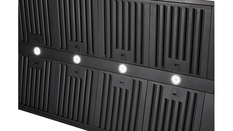 A detailed close up view of a black range hood and it 4 LED lights and grille A detailed close up view of a black range hood and it 4 LED lights and grille