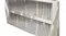 Close-up of a stainless steel rangehood with slotted filters and four built-in lights Close-up of a stainless steel rangehood with slotted filters and four built-in lights
