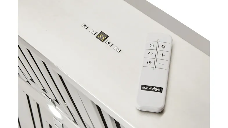 Rangehood top panel with LED display and remote control labelled “Schweigen” Rangehood top panel with LED display and remote control labelled “Schweigen”