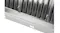 Close-up of a rangehood edge with vertical baffle filters and built-in rectangular light below Close-up of a rangehood edge with vertical baffle filters and built-in rectangular light below