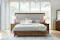Milford Extended Californian King Bed Frame with wooden bed, white bedding, two lamps, and large windows with blinds Milford Extended Californian King Bed Frame with wooden bed, white bedding, two lamps, and large windows with blinds