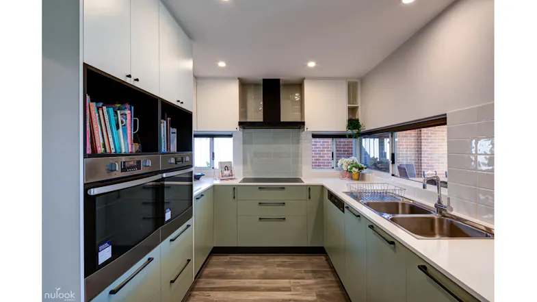 Compact modern kitchen with ample storage, a double sink, and minimalist cabinetry design Compact modern kitchen with ample storage, a double sink, and minimalist cabinetry design