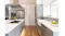 Minimalist kitchen with grey cabinets, island cooktop, and stainless steel rangehood above Minimalist kitchen with grey cabinets, island cooktop, and stainless steel rangehood above