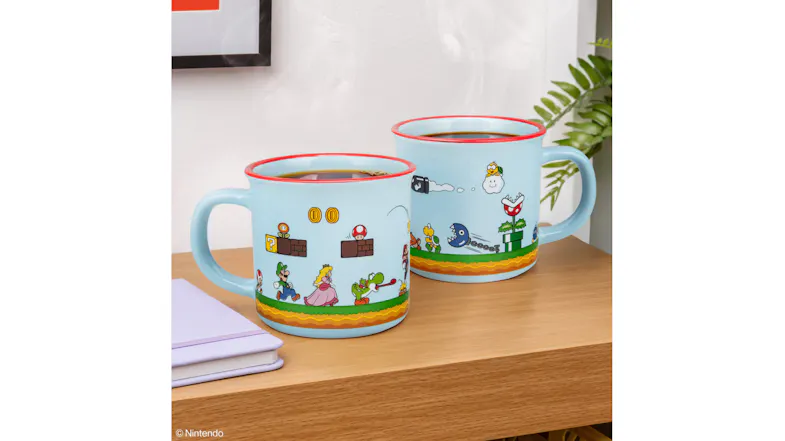 Two Super Mario-themed mugs filled with coffee on a wooden table, placed beside books and a houseplant Two Super Mario-themed mugs filled with coffee on a wooden table, placed beside books and a houseplant