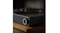 Close-up of the Victrola Stream black turntable front corner showing textured finish and circular control knob on wood cabinet Close-up of the Victrola Stream black turntable front corner showing textured finish and circular control knob on wood cabinet