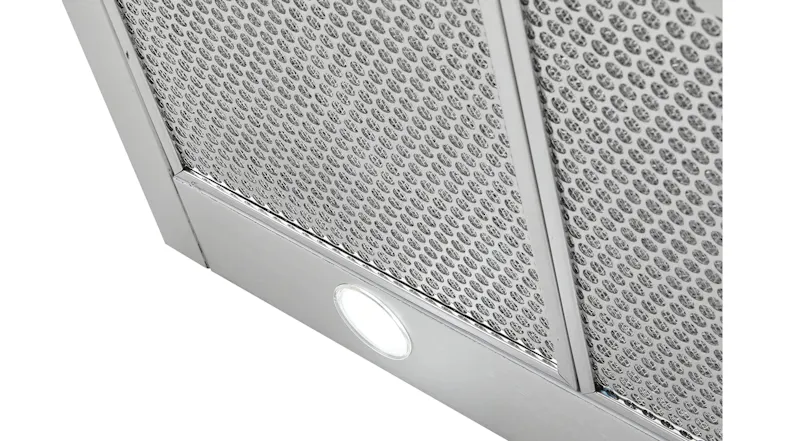 Close-up of the rangehood underside showing the metal filter and a round built-in light on a stainless steel panel Close-up of the rangehood underside showing the metal filter and a round built-in light on a stainless steel panel